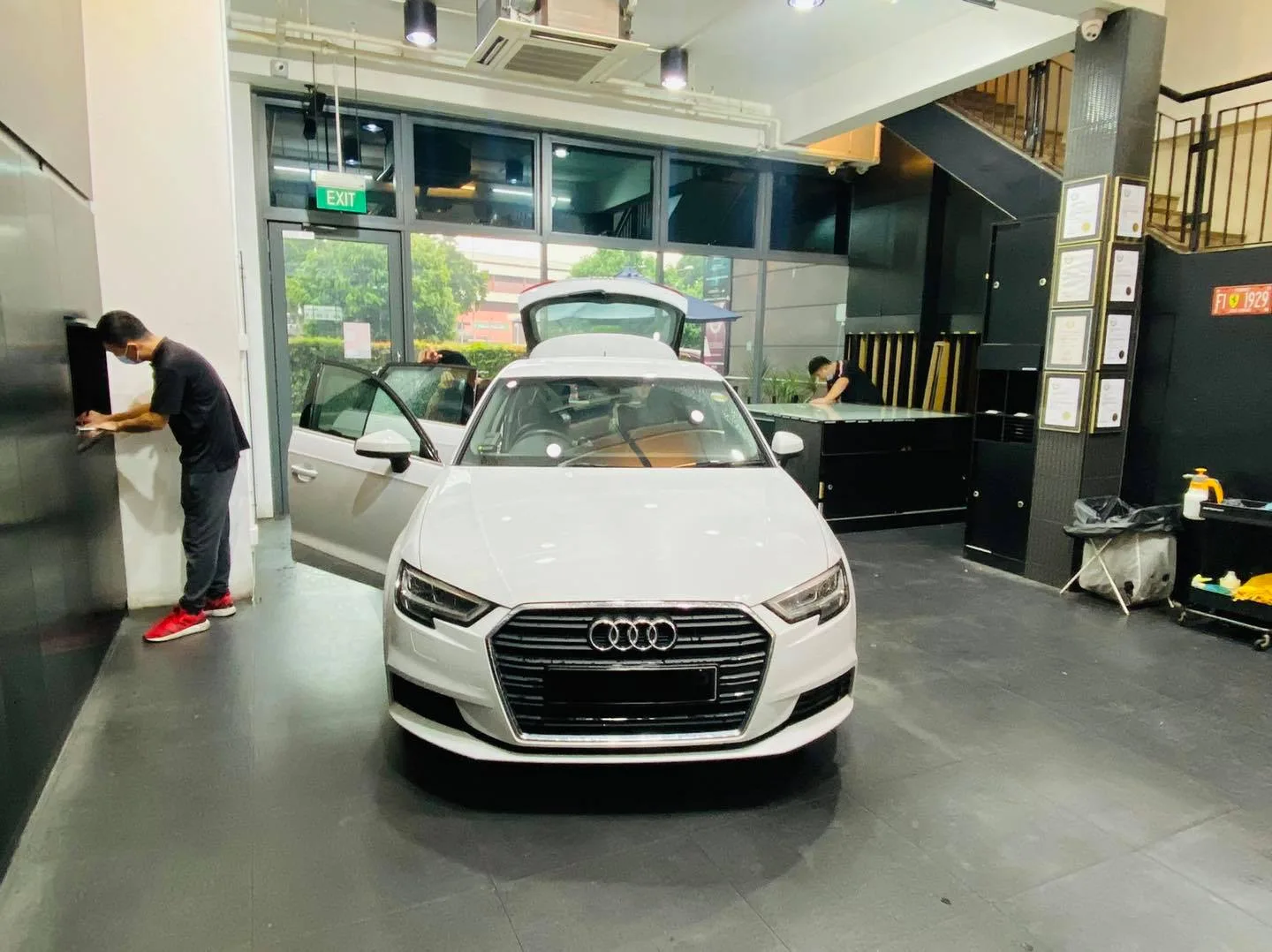 White Audi in for window film at Infratint Singapore