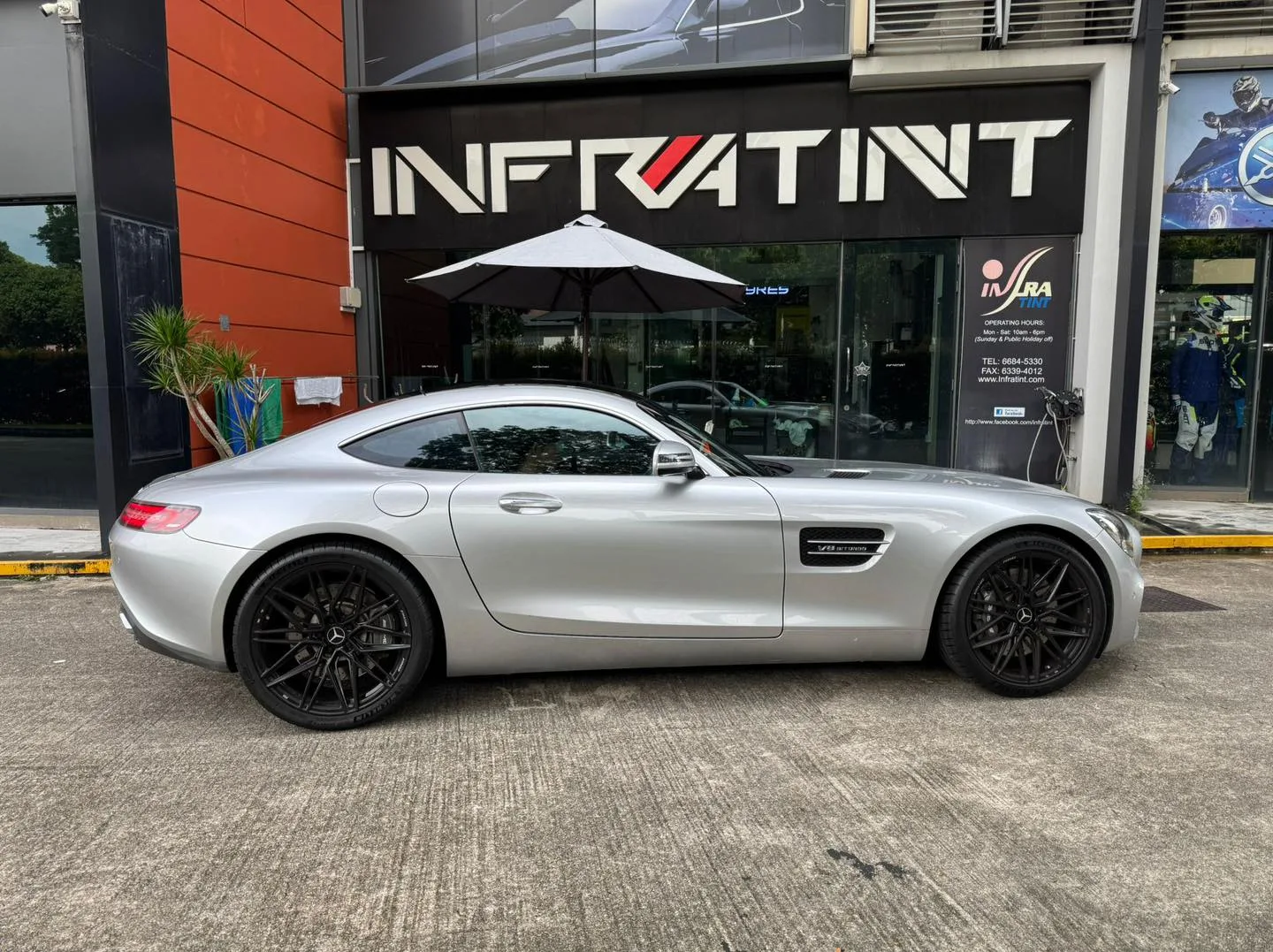 Silver Mercedes-AMG GT side profile outside Infratint Singapore