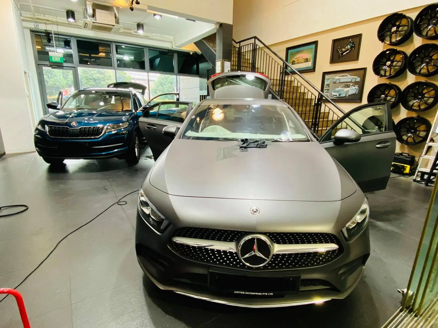 Matte grey Mercedes-Benz A-Class with a Skoda SUV behind at Infratint Singapore
