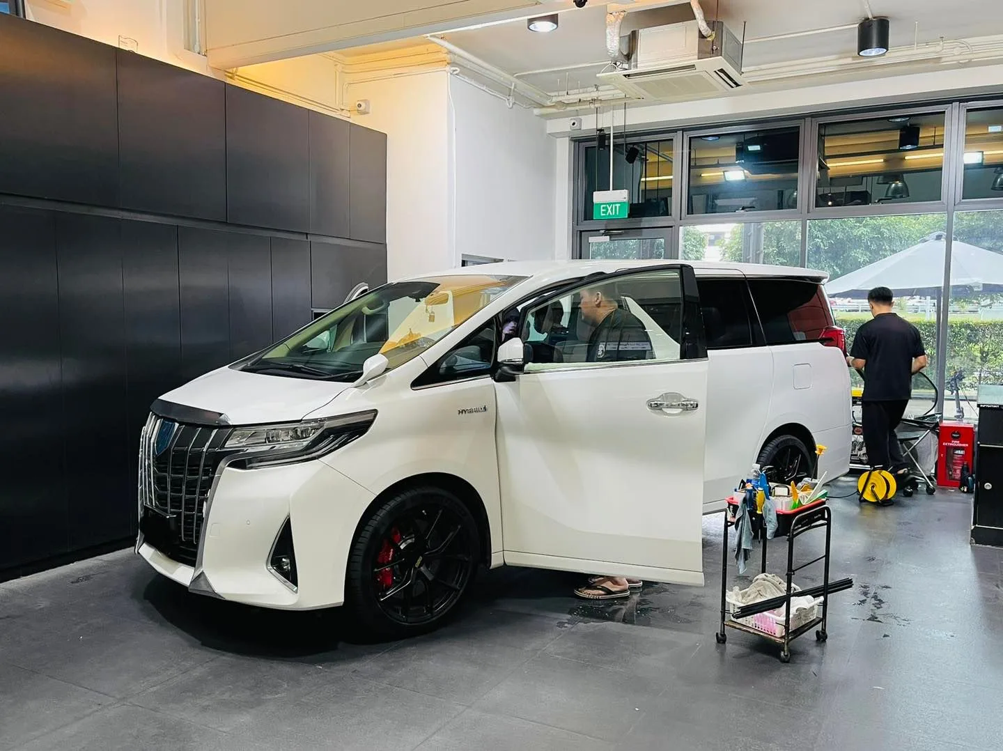 White Toyota Alphard being tinted from the side at Infratint Singapore