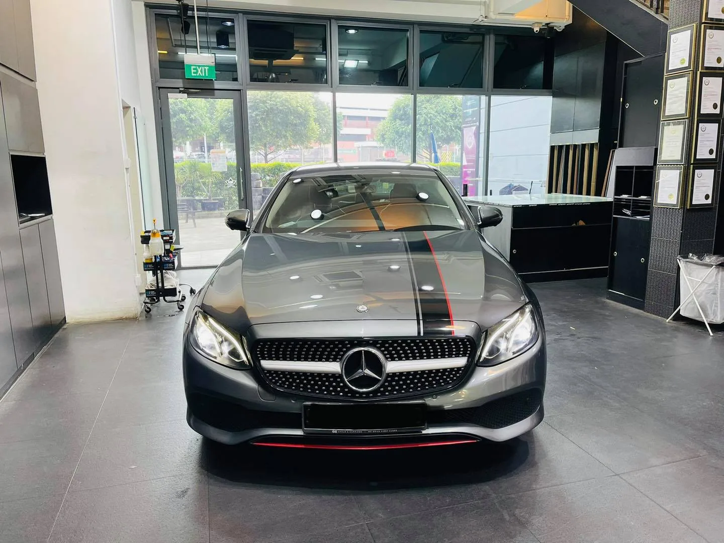 Grey Mercedes-Benz C-Class coupe with red bonnet stripe at Infratint Singapore for window tinting