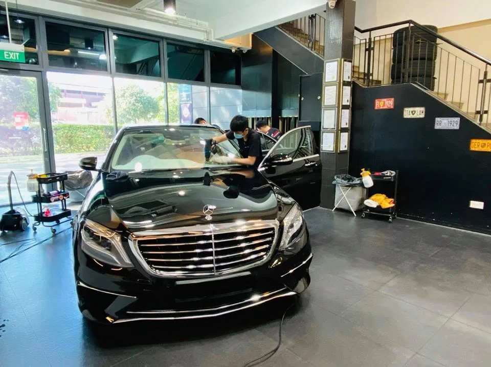 Black Mercedes-Benz S-Class sedan getting windscreen film installed at Infratint Singapore