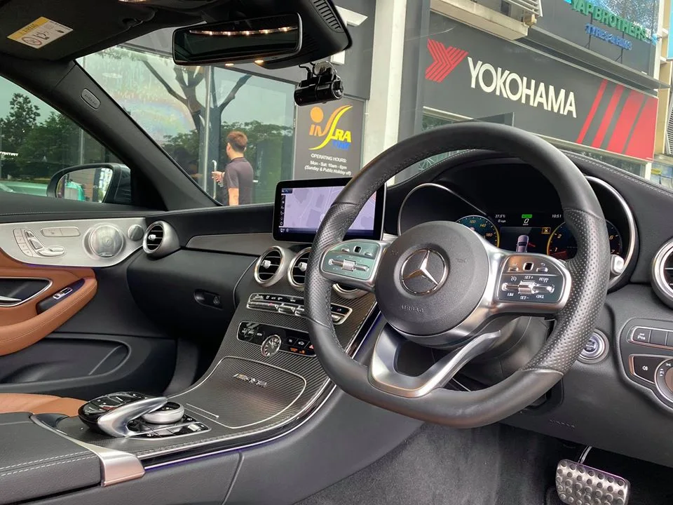 Dashboard and steering wheel of a Mercedes-Benz C-Class Coupe at Infratint Singapore