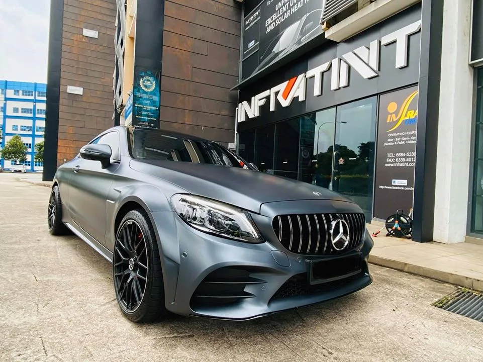 Close-up front of a satin grey Mercedes-Benz C-Class Coupe at Infratint Singapore