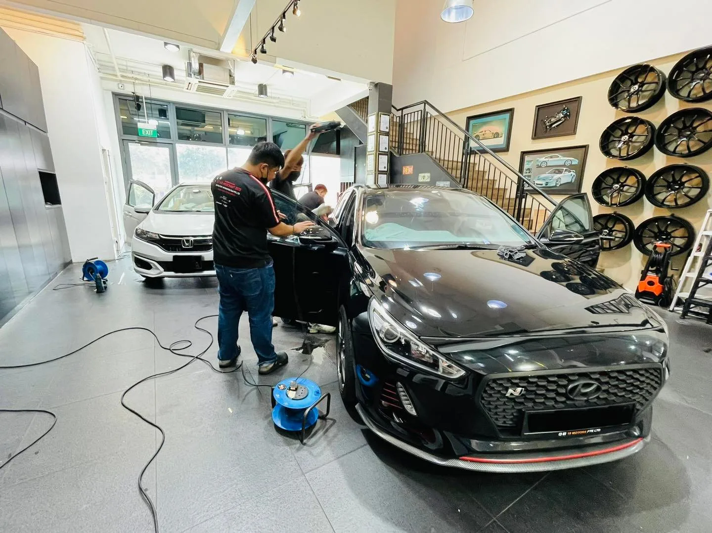 Black Hyundai i30 hot hatch being tinted at Infratint Singapore
