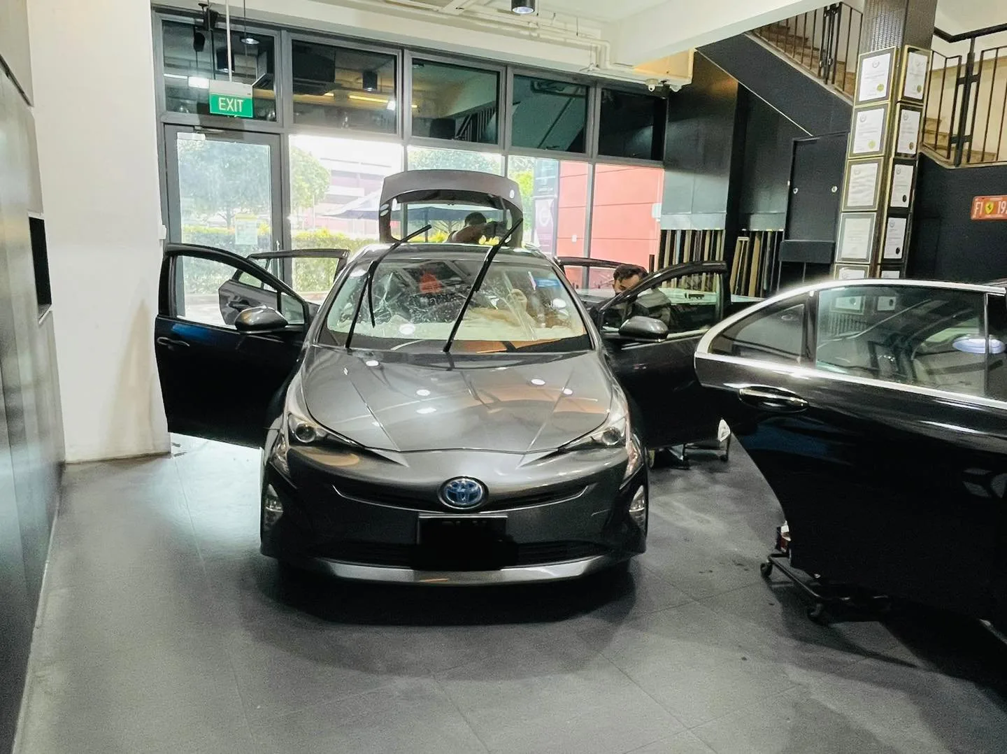 Bronze Toyota Prius open for window tinting at Infratint Singapore