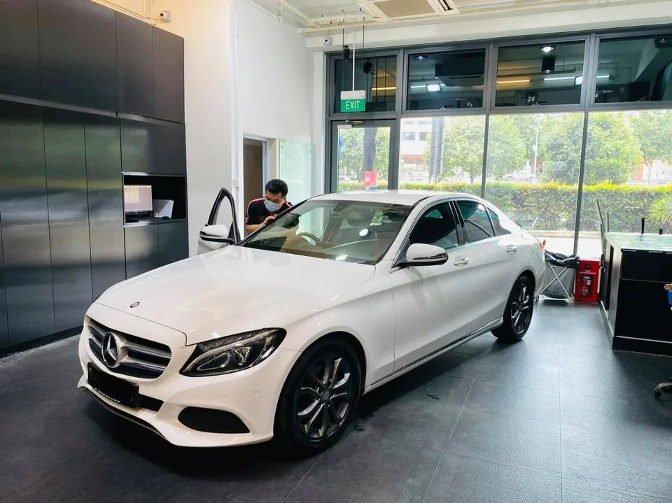 White Mercedes-Benz C-Class sedan at Infratint Singapore for window film