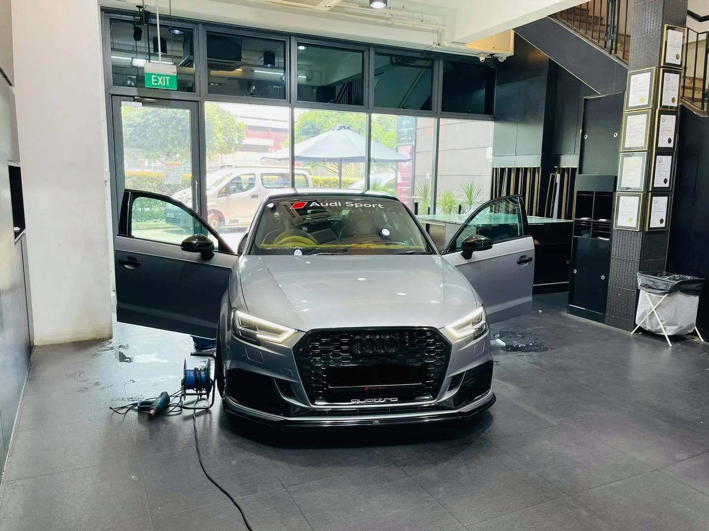 Front view of a silver Audi hatch at Infratint Singapore for window tinting