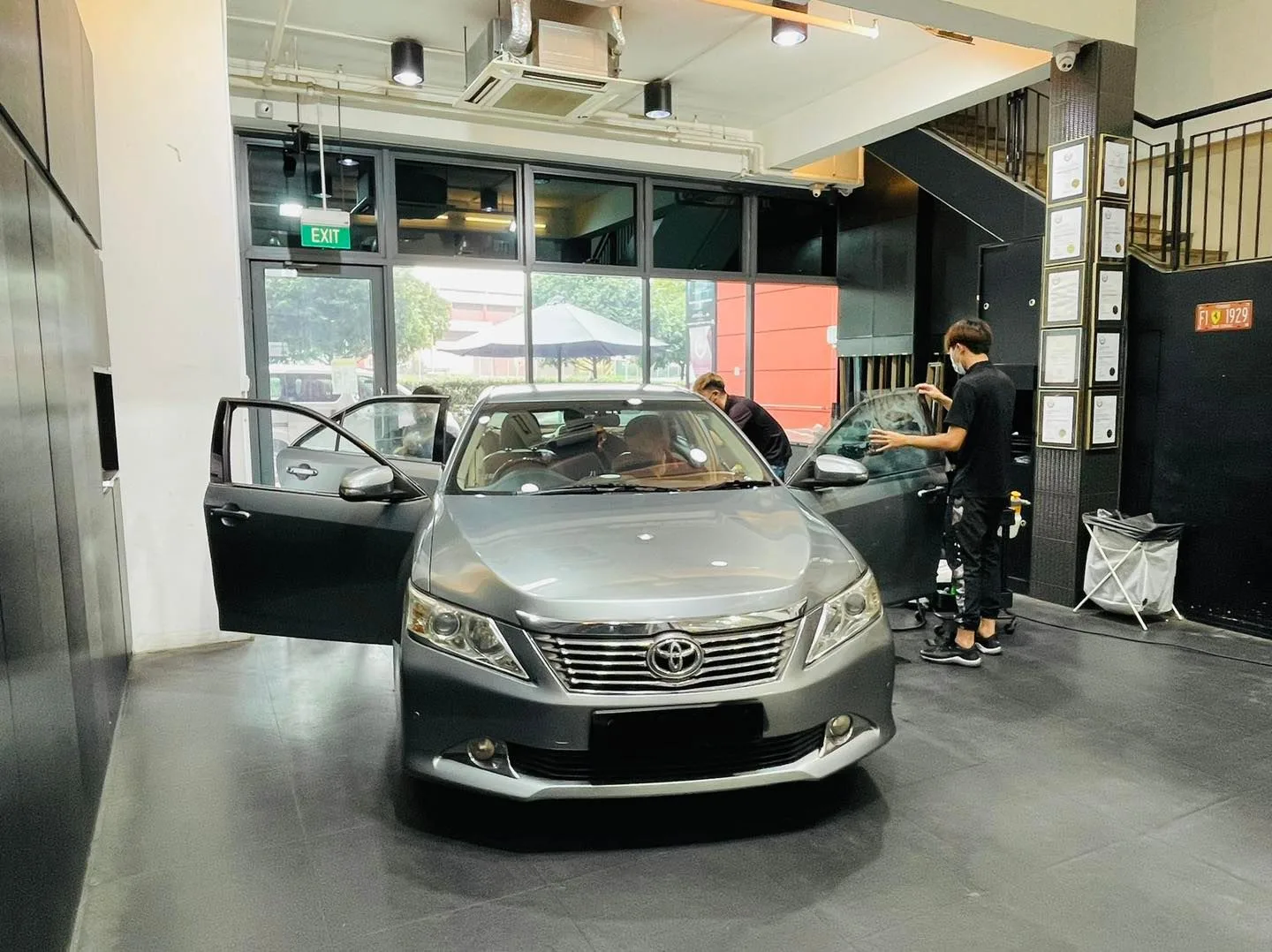 Grey Toyota Camry in for window tinting at Infratint Singapore