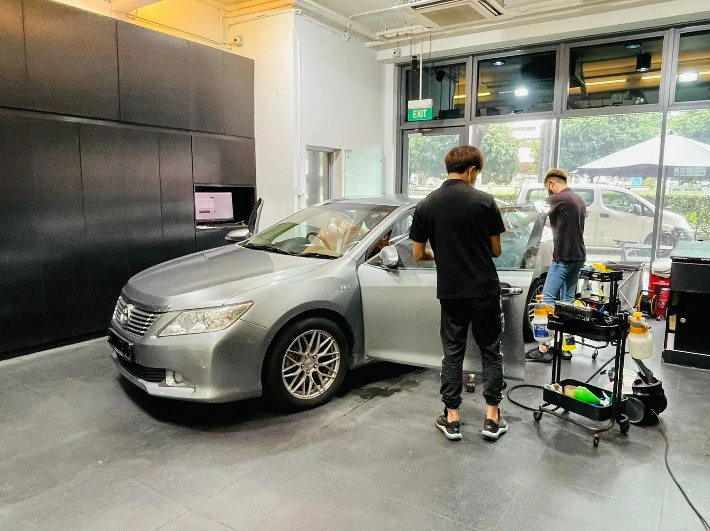 Silver Toyota Camry having window film applied at Infratint Singapore
