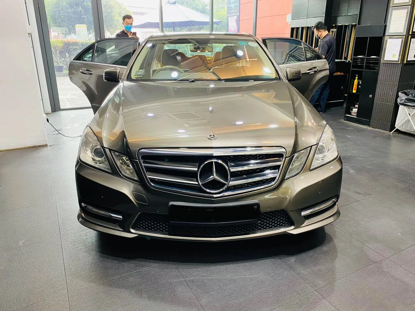 Grey Mercedes-Benz E-Class sedan front view at Infratint Singapore for window tinting