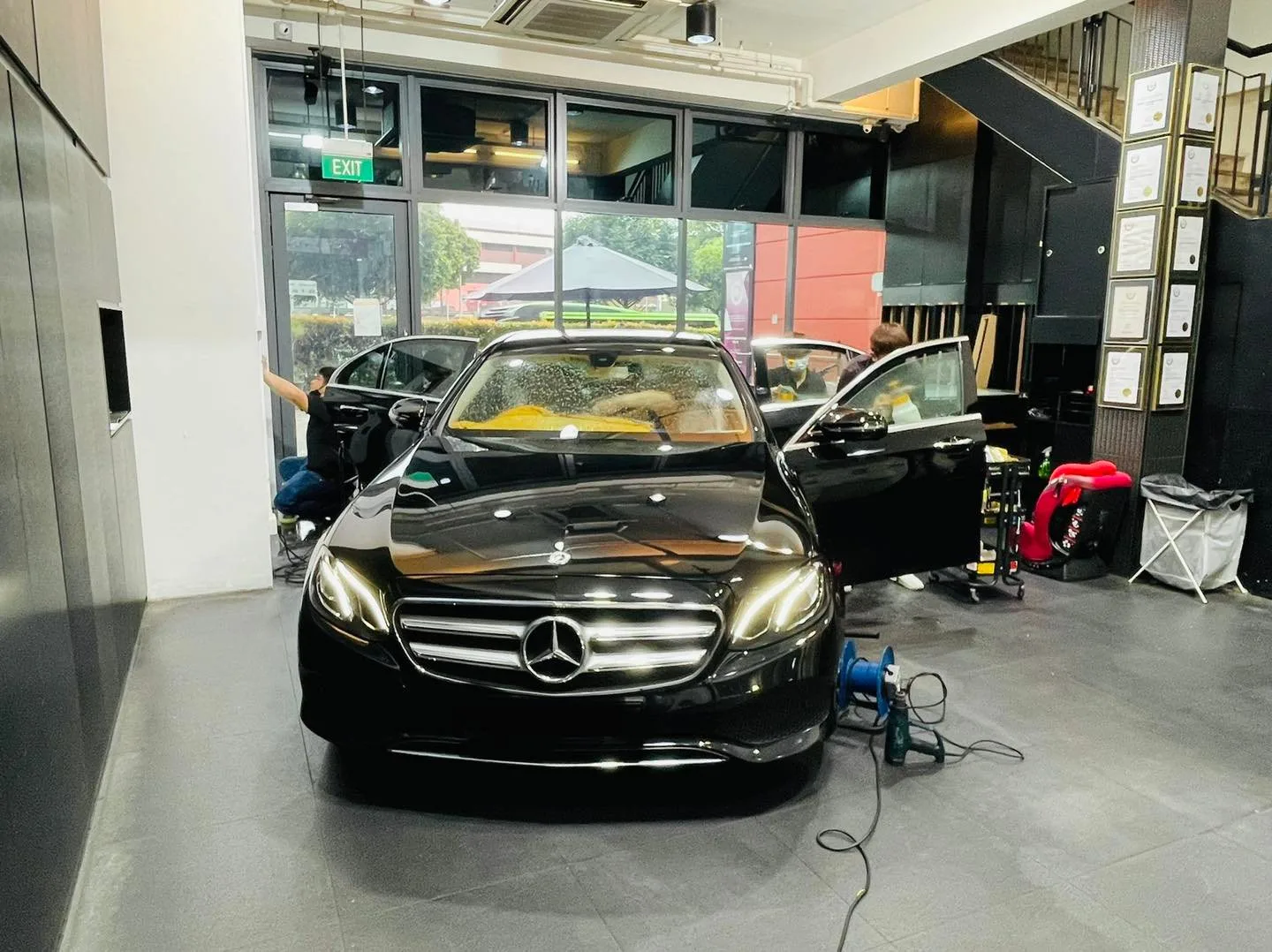 Black Mercedes-Benz E-Class front view at Infratint Singapore window tinting bay