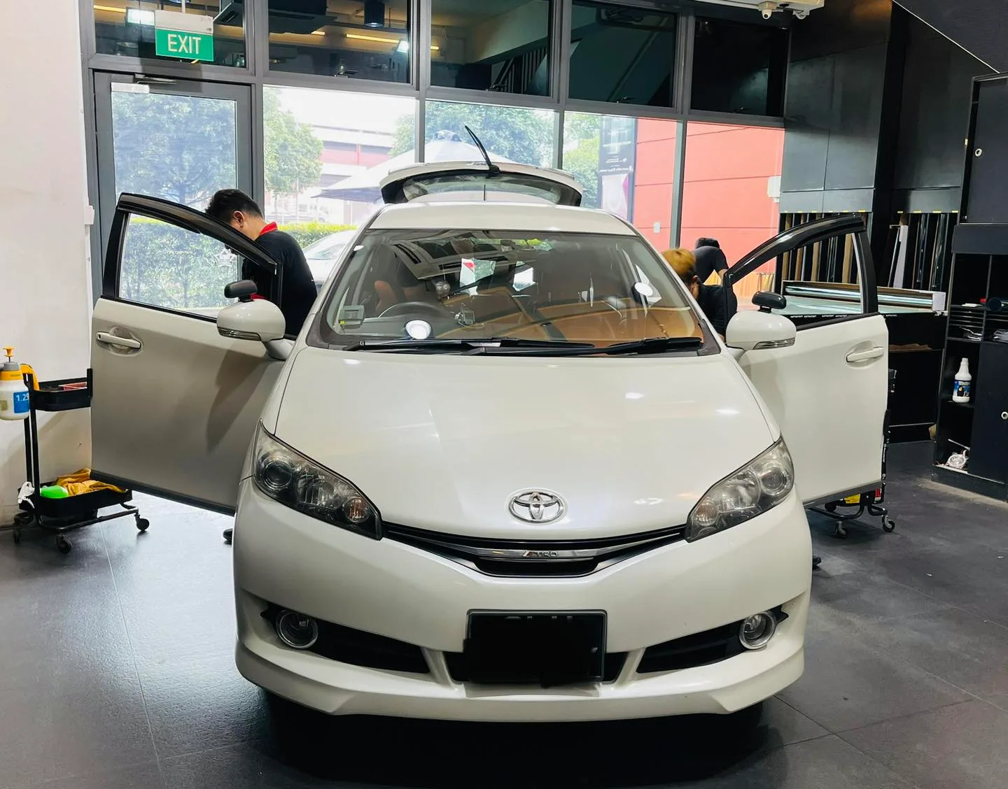 White Toyota Wish MPV having window film fitted at Infratint Singapore