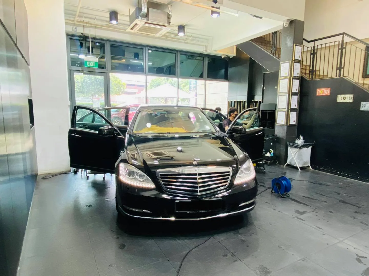 Black Mercedes-Benz S-Class being tinted with doors open at Infratint Singapore