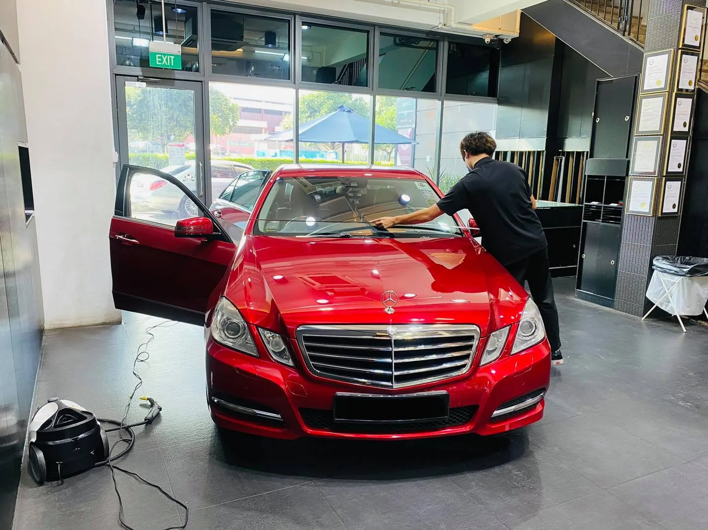 Red Mercedes-Benz E-Class being tinted at Infratint Singapore