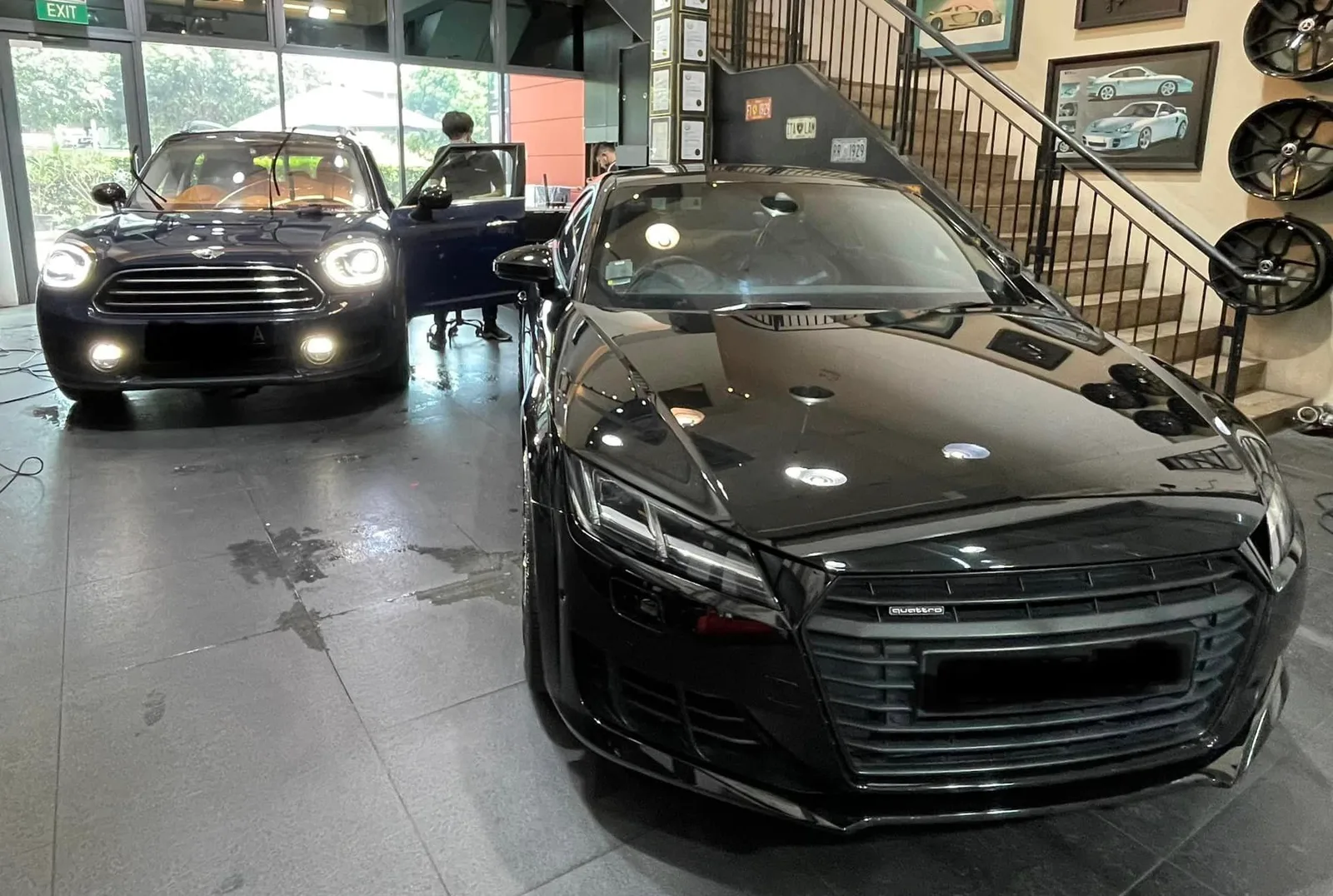 Black Audi TT and black Mini Countryman in the Infratint Singapore showroom