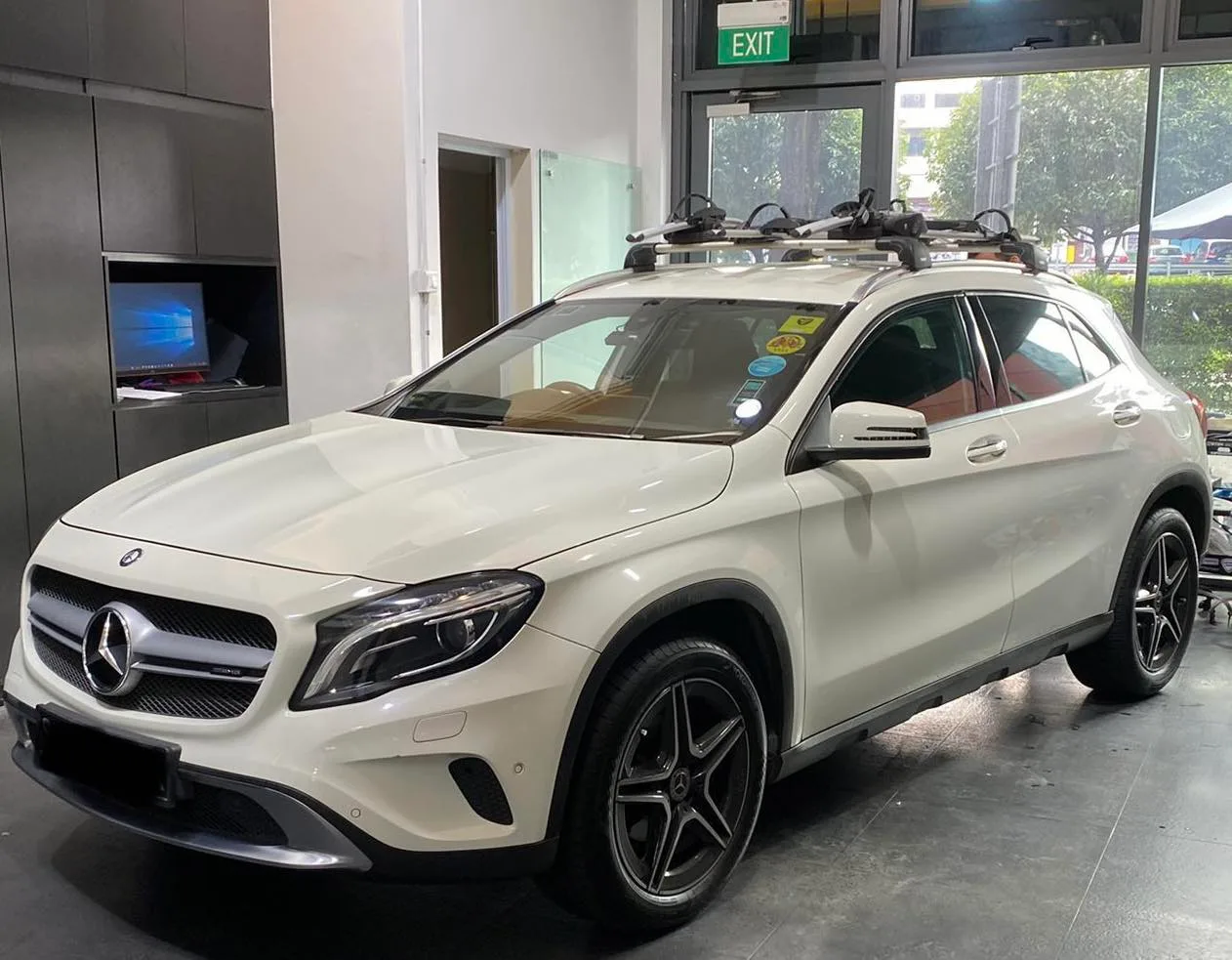 White Mercedes-Benz GLA front three-quarter view with tinted windows at Infratint Singapore