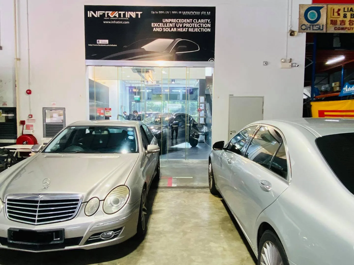 Silver Mercedes-Benz E-Class and S-Class under the Infratint Singapore banner