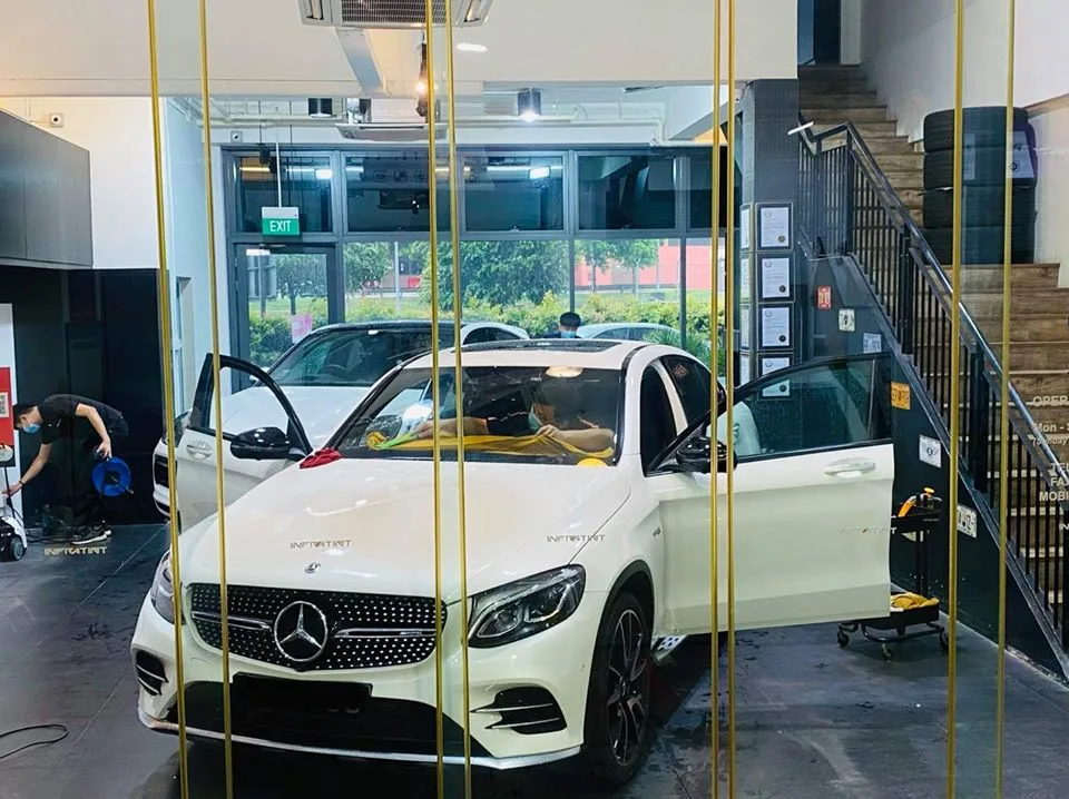 White Mercedes-AMG GLC SUV having window film installed at Infratint Singapore
