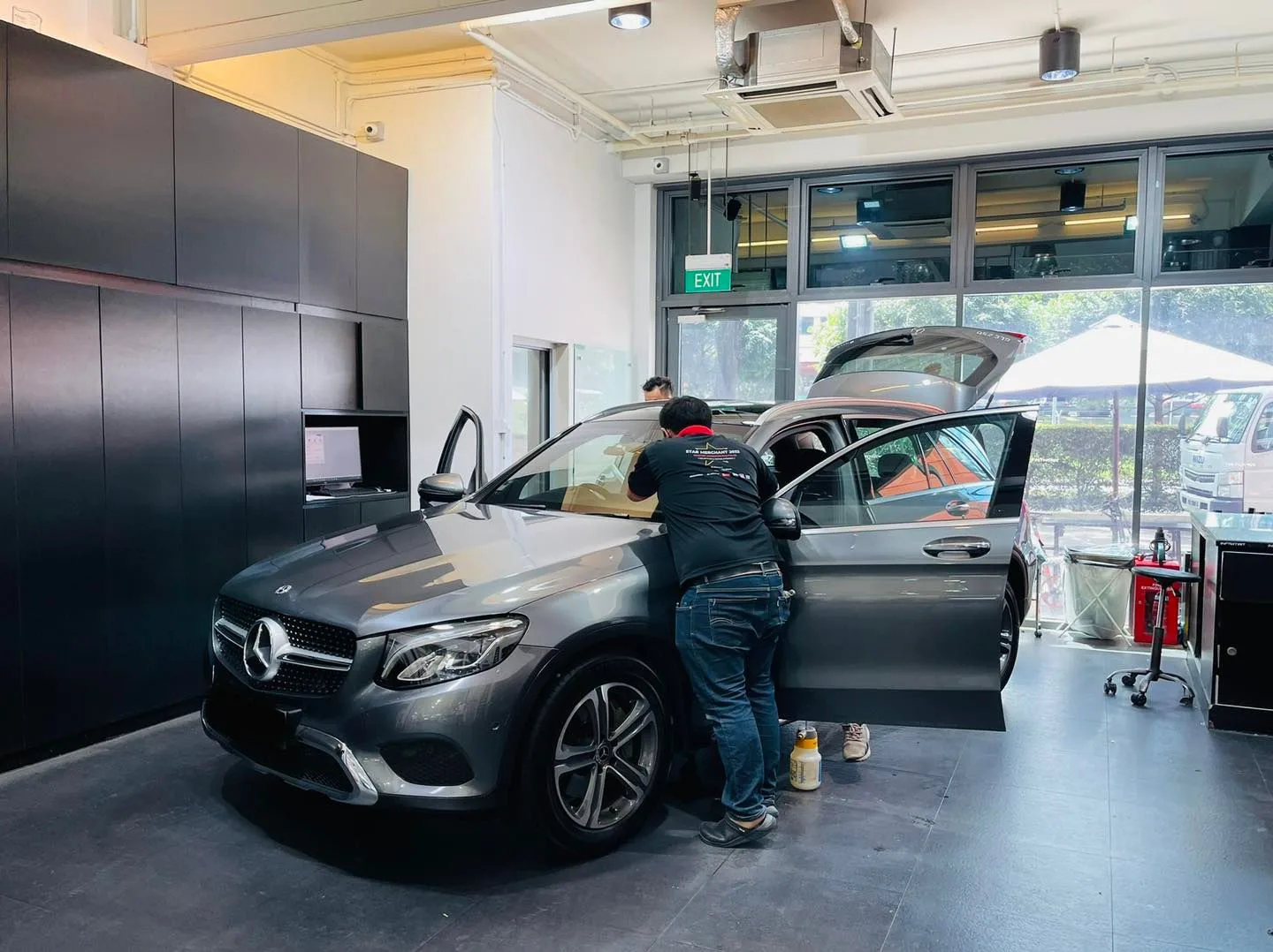 Grey Mercedes-Benz GLC SUV during window tinting at Infratint Singapore
