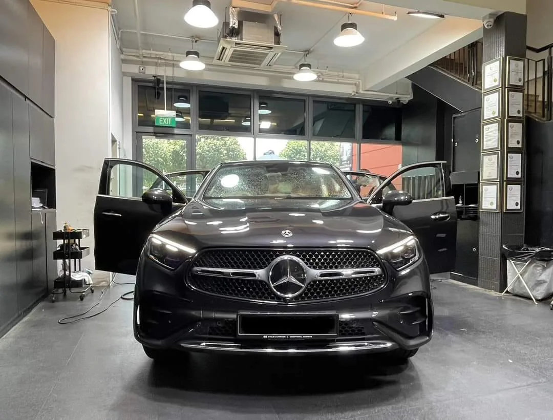 Mercedes-Benz GLC300e inside the Infratint installation bay with doors open