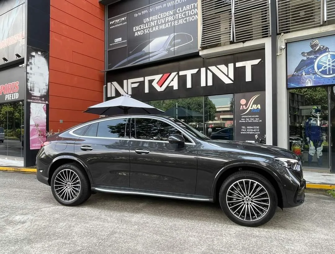 Tinted dark grey Mercedes-Benz GLC300e side profile outside Infratint Singapore