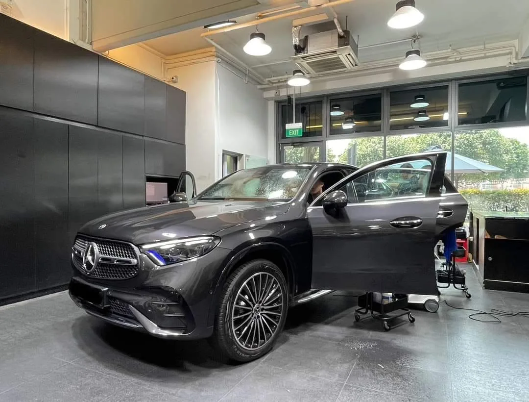 Mercedes-Benz GLC300e mid-install at Infratint with a door open
