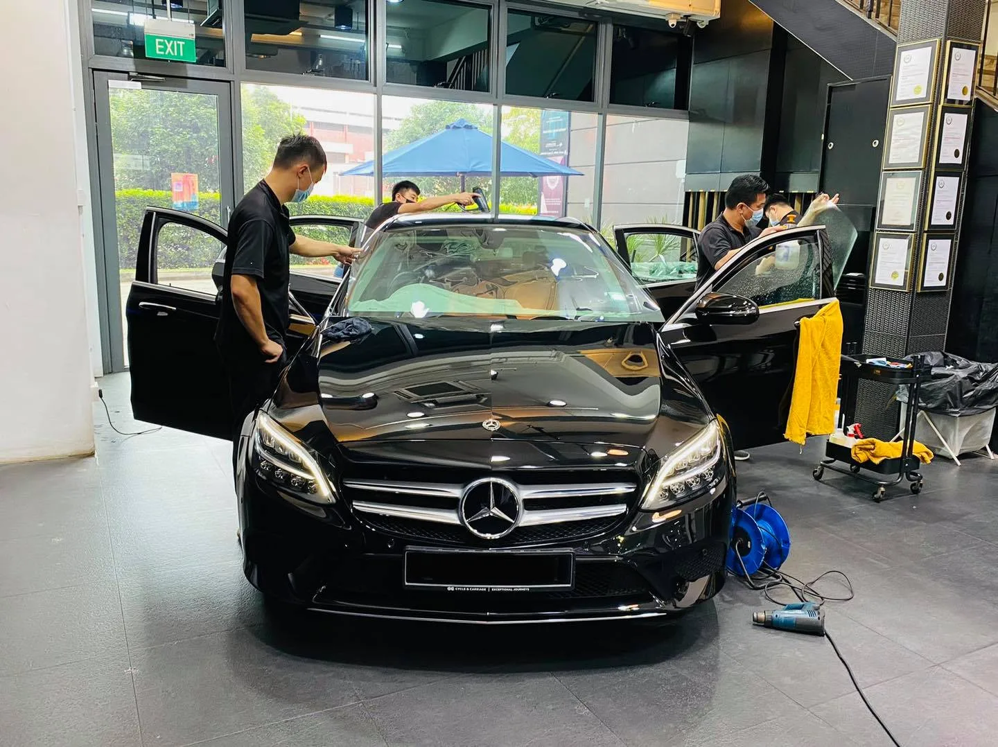 Black Mercedes-Benz C-Class sedan having windows tinted at Infratint Singapore