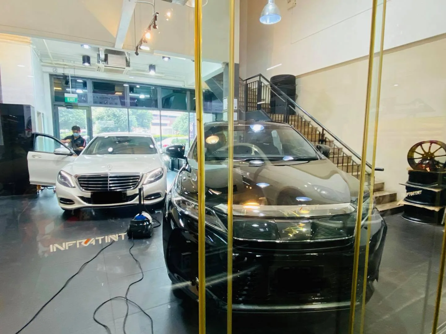 White Mercedes-Benz S-Class being prepared for window film at Infratint Singapore