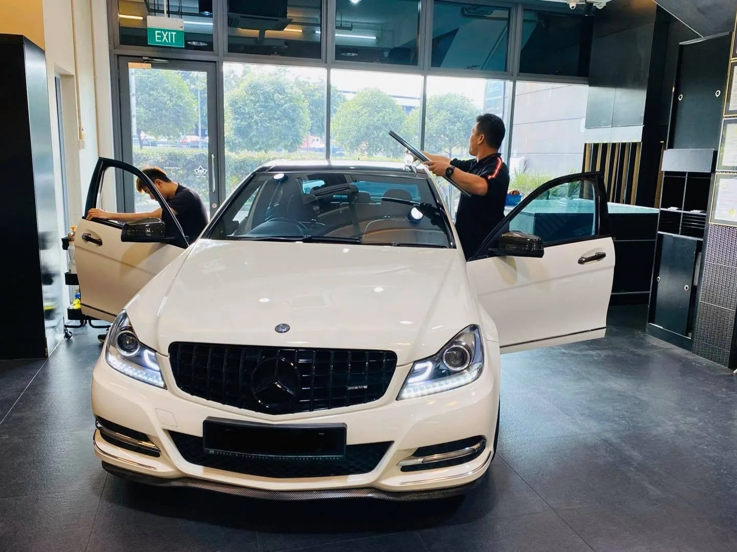 White Mercedes-Benz C-Class W204 sedan having its windscreen tinted at Infratint Singapore