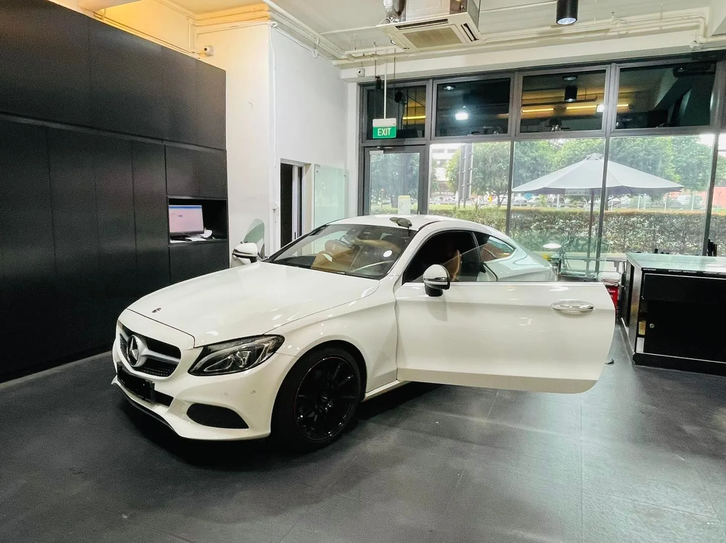 White Mercedes-Benz coupe front three-quarter at Infratint Singapore for window tinting