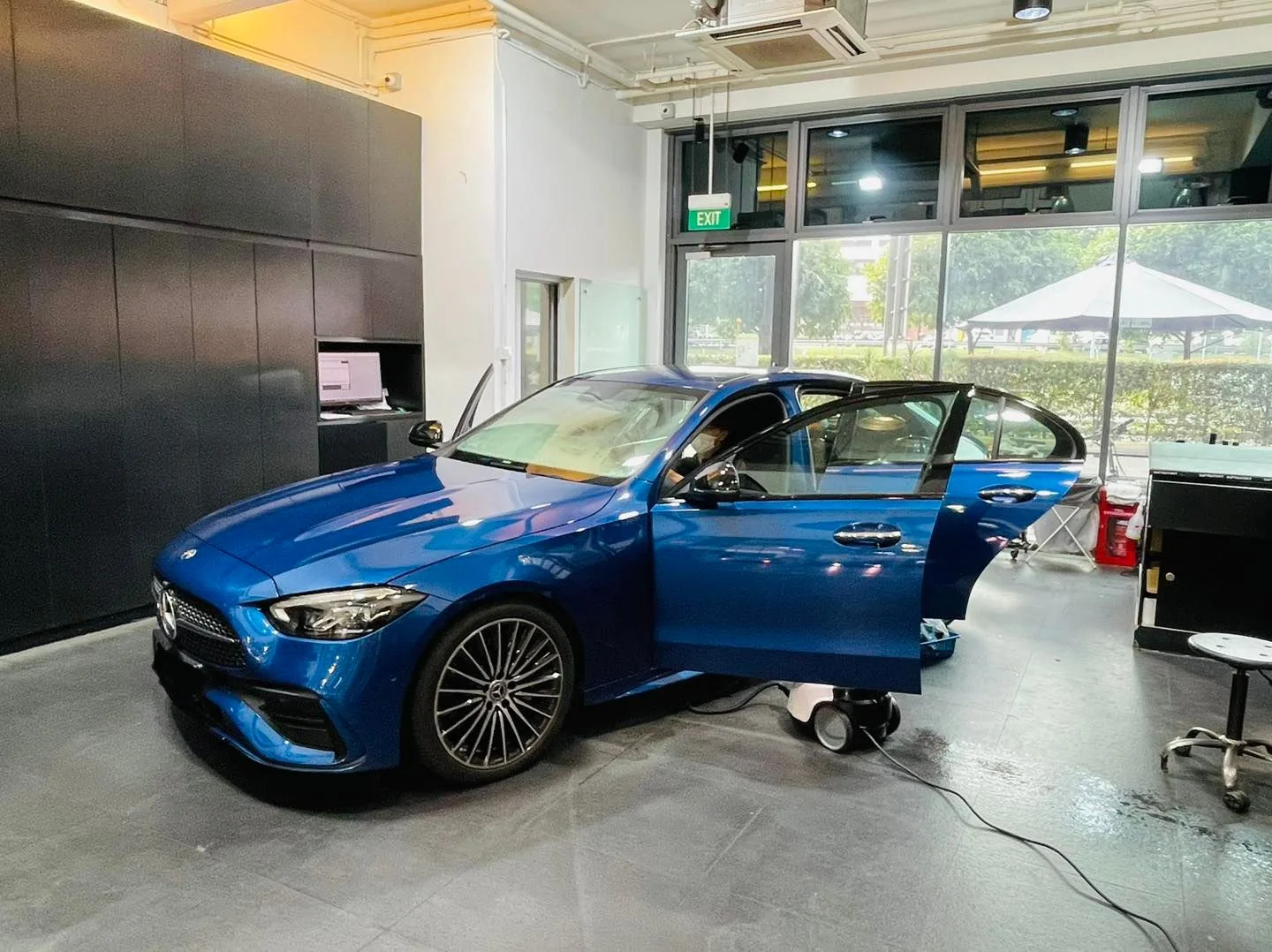 Blue Mercedes-Benz C-Class side profile in the install bay at Infratint Singapore