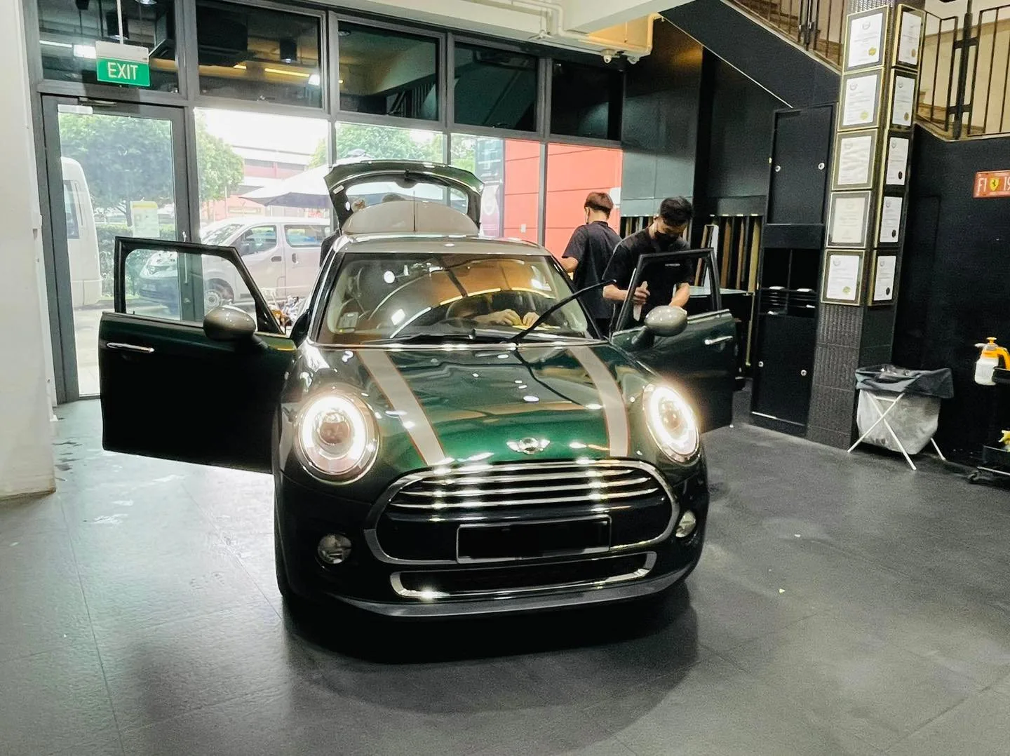 Green Mini Cooper hatchback at Infratint Singapore for window tinting
