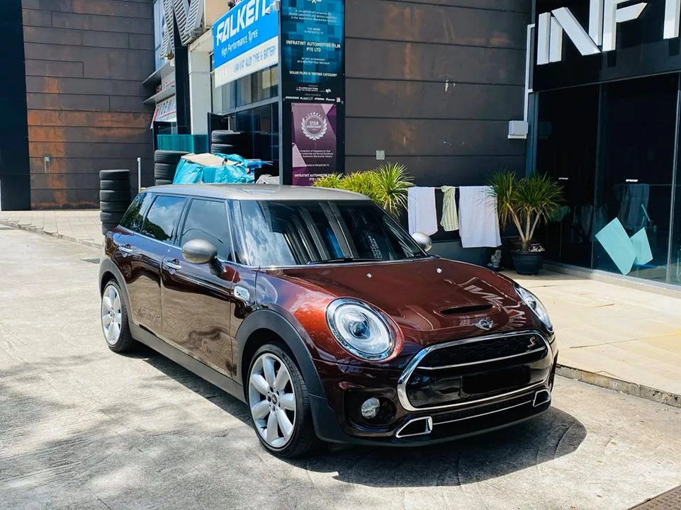 Dark brown Mini Cooper S Clubman front three-quarter outside Infratint Singapore