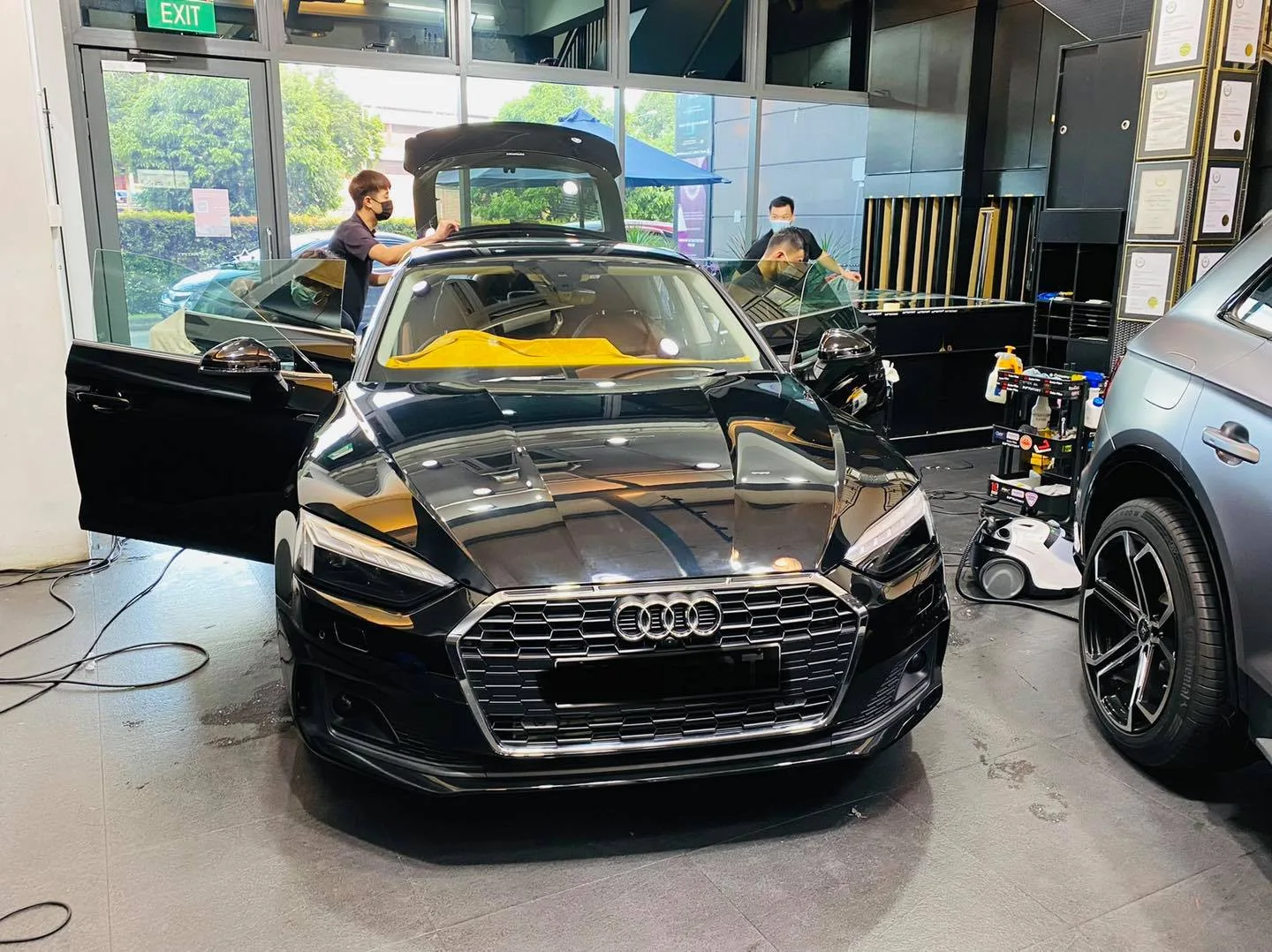 Black Audi A5 sportback having window film installed at Infratint Singapore
