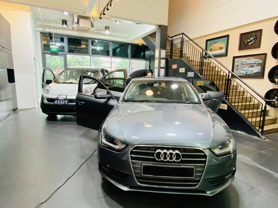 Grey Audi A4 sedan during window tinting at Infratint Singapore