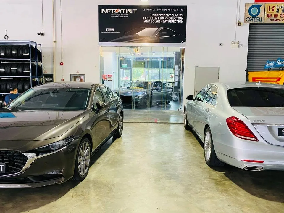 Bronze Mazda 3 and silver Mercedes-Benz S-Class at Infratint Singapore