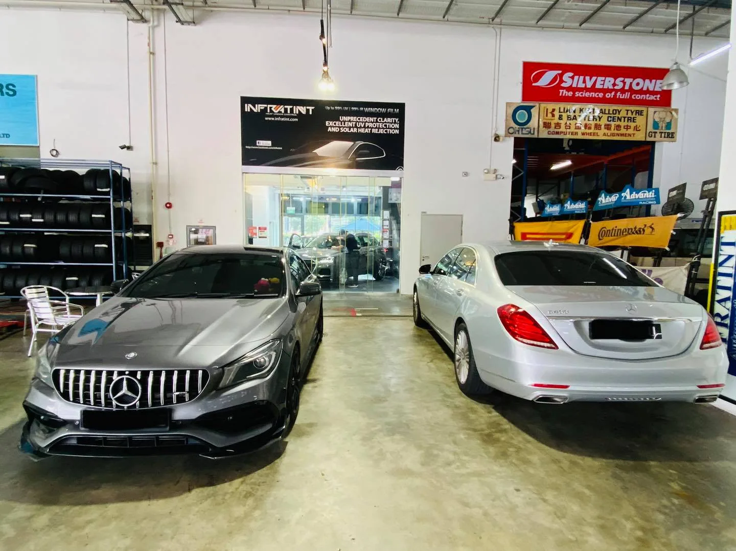 Grey Mercedes-Benz CLA and silver S-Class at Infratint Singapore for window tinting