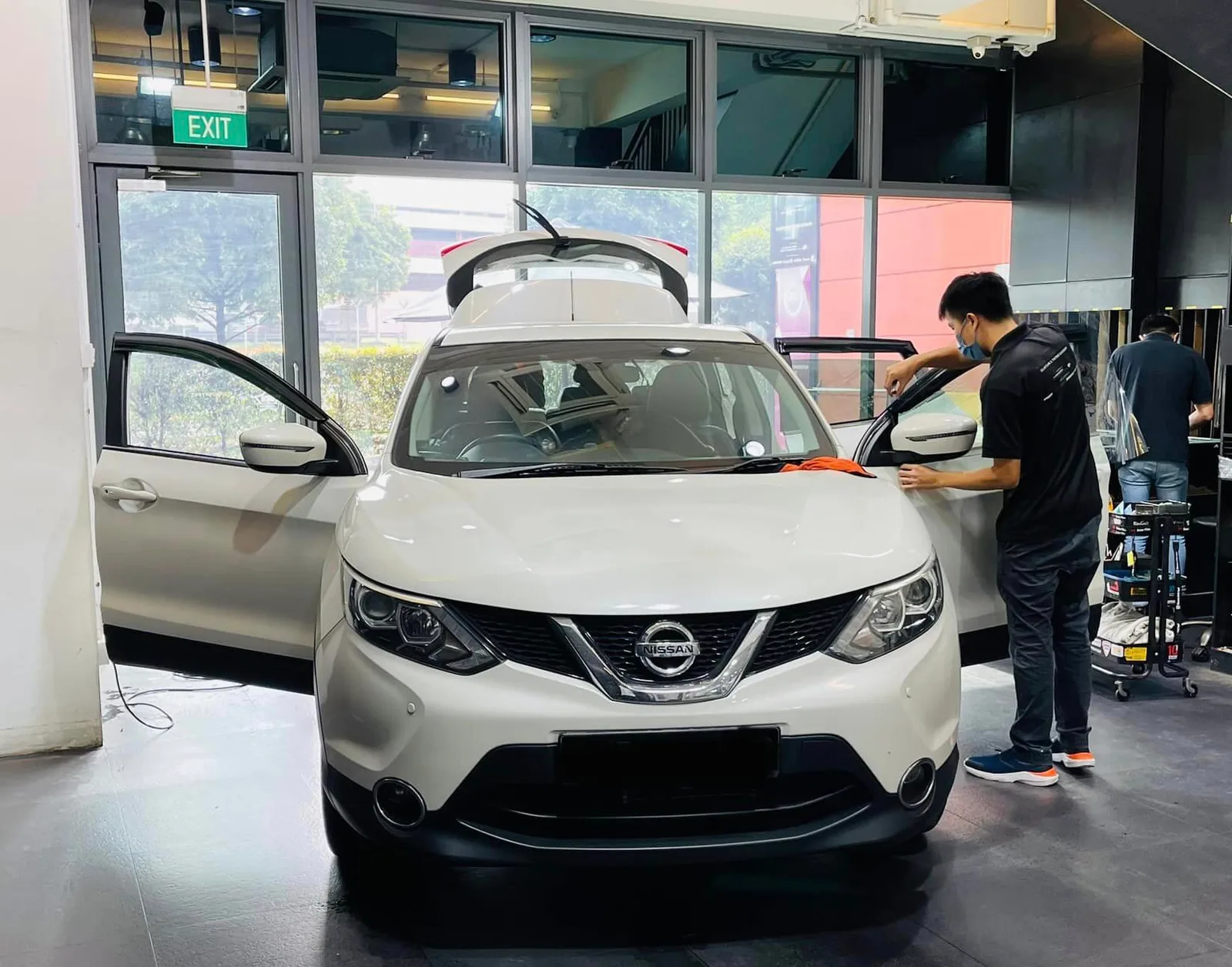White Nissan Qashqai having window film installed at Infratint Singapore