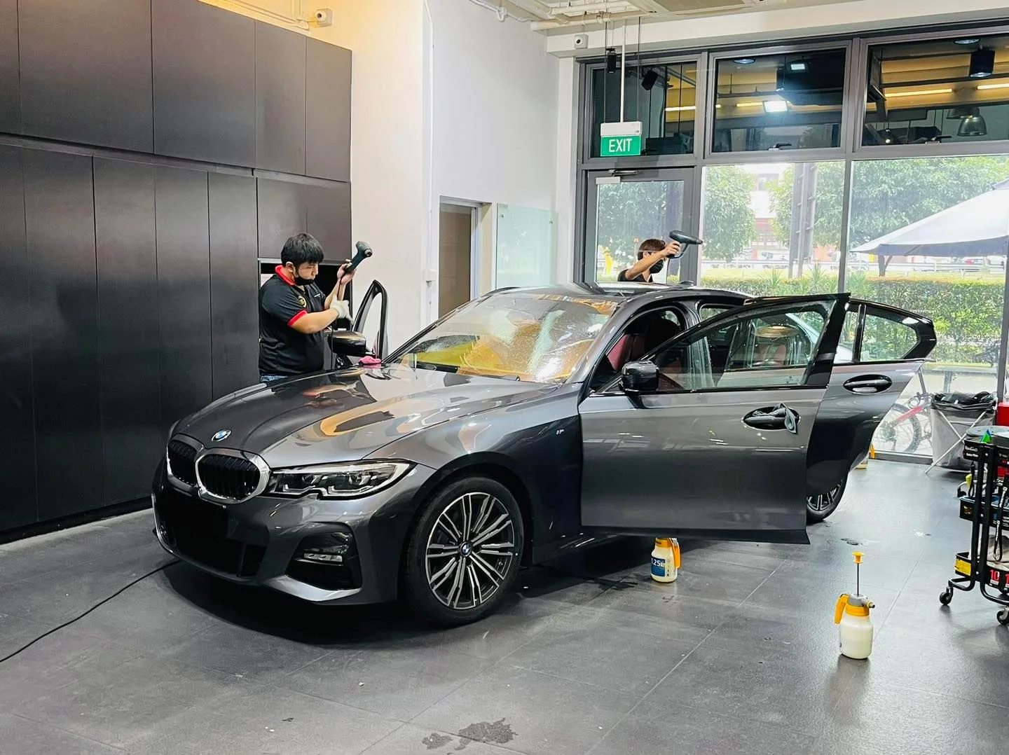 Grey BMW 3 Series having its windscreen tinted at Infratint Singapore