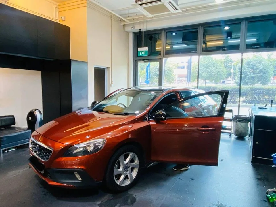 Copper-orange Volvo V40 Cross Country at Infratint Singapore for window tinting