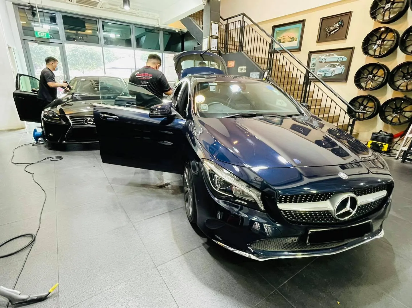Dark blue Mercedes-Benz CLA and Lexus IS sedan at Infratint Singapore