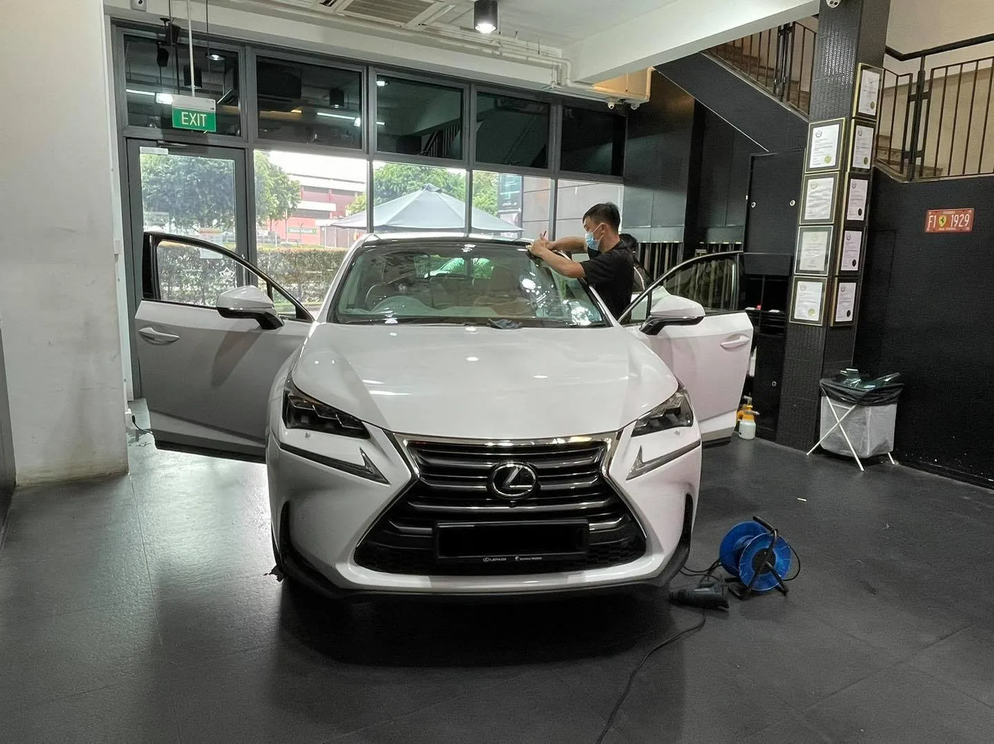 Silver Lexus NX SUV front view during tinting at Infratint Singapore