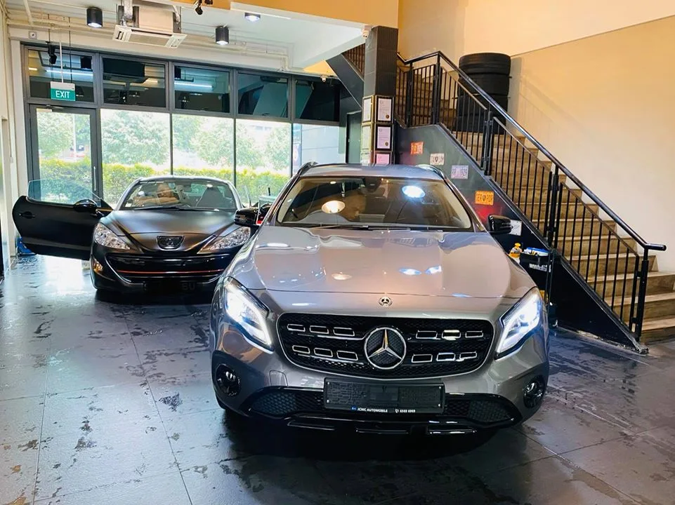 Grey Mercedes-Benz GLA and matte Peugeot RCZ at Infratint Singapore for tinting