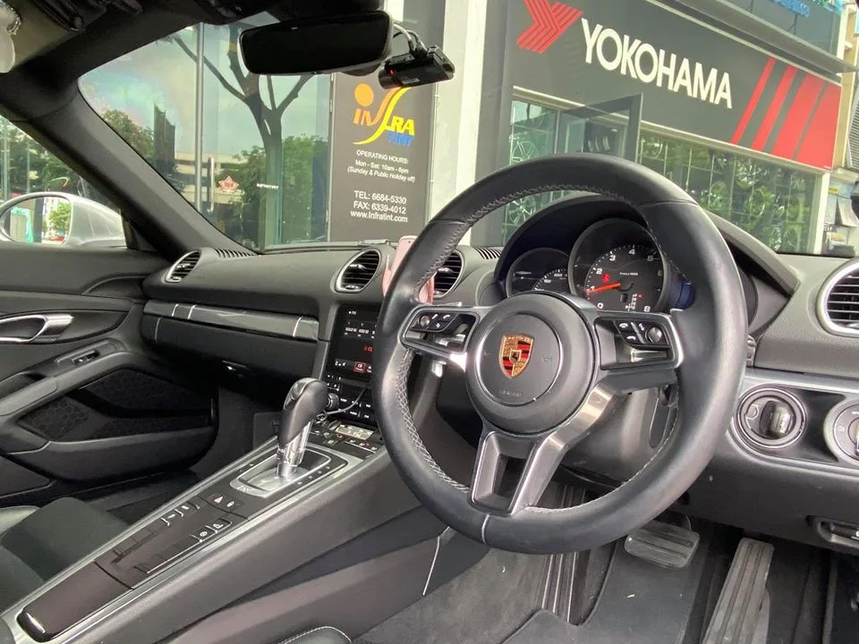Porsche 718 Cayman interior and steering wheel at Infratint Singapore