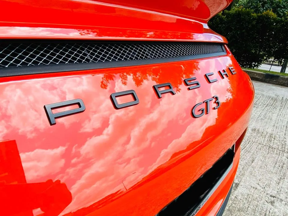 Close-up of the Porsche GT3 rear badging at Infratint Singapore