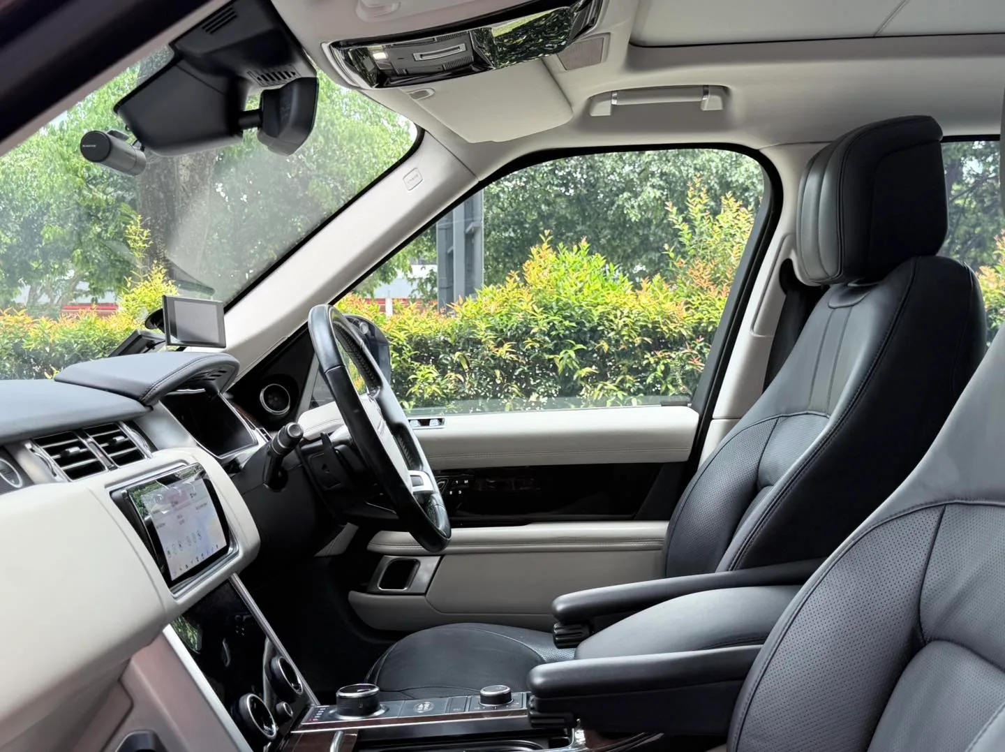 Range Rover Autobiography leather interior seen through tinted glass at Infratint Singapore