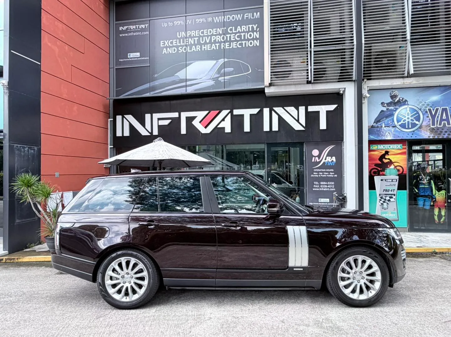 Tinted Range Rover Autobiography side profile outside Infratint Singapore