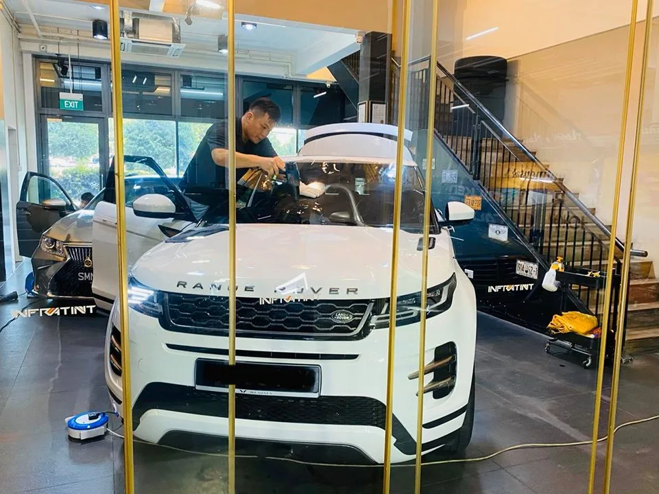 White Range Rover Evoque having windscreen film fitted at Infratint Singapore