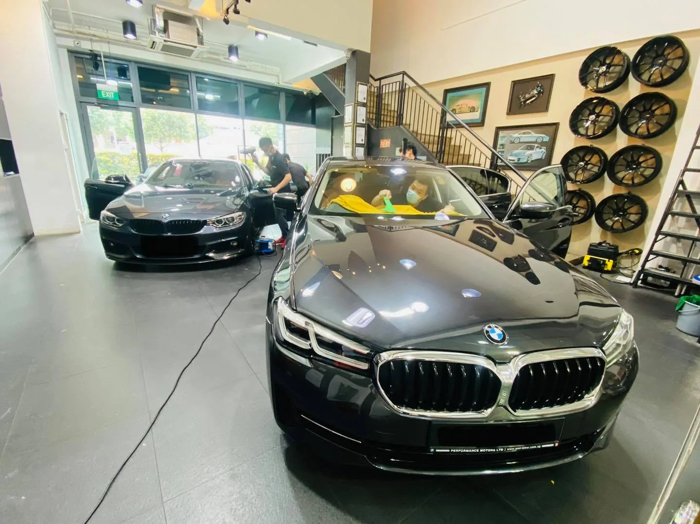 Dark BMW 5 Series being tinted at Infratint Singapore